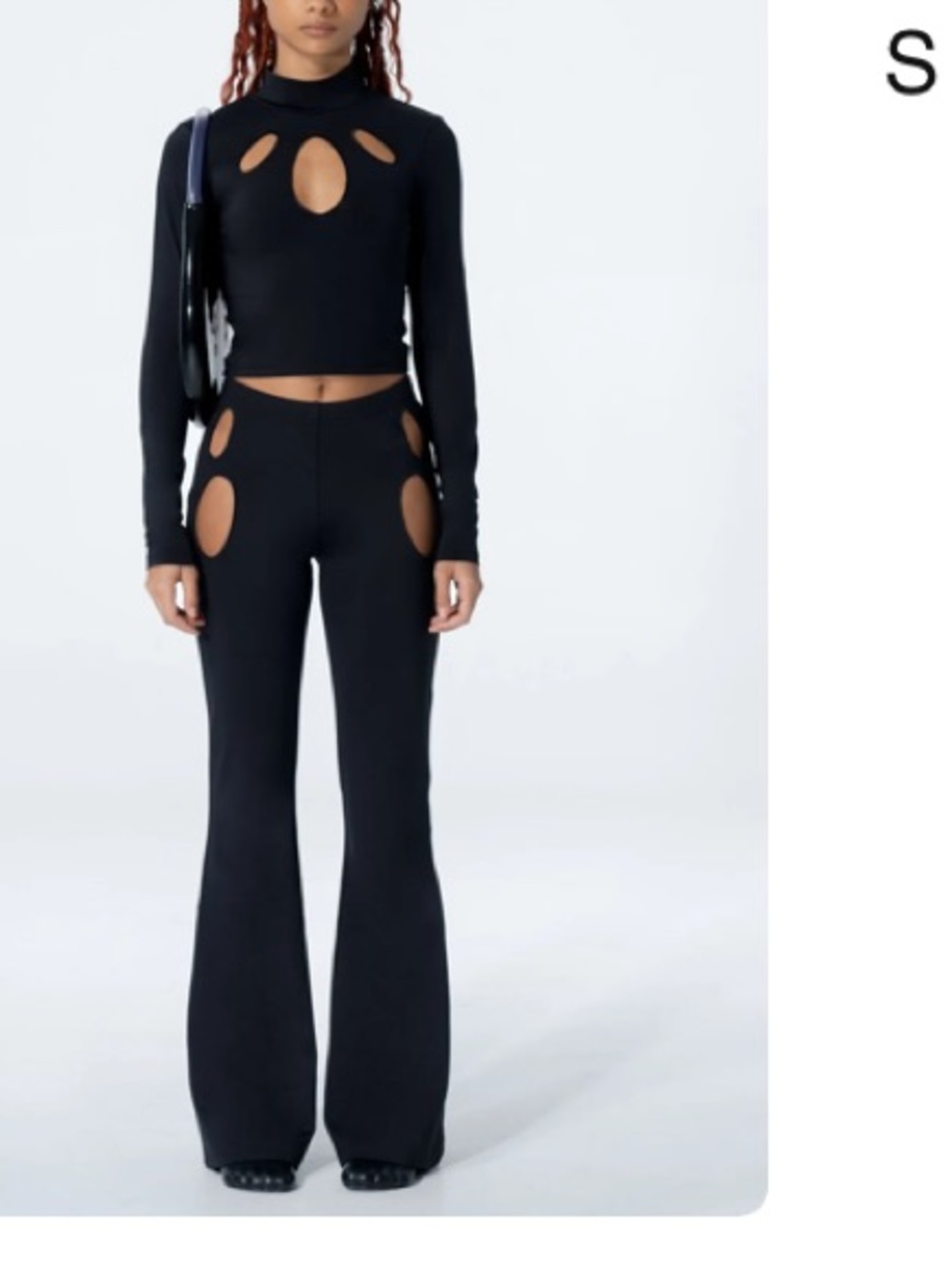 Sleek Black Cutout Flare Pants